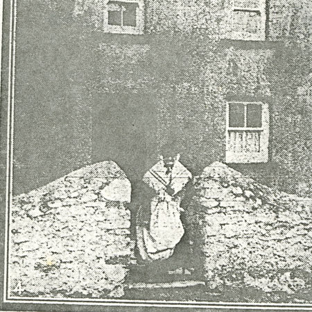 Cutting of Mary Palmer dressed in traditional costume